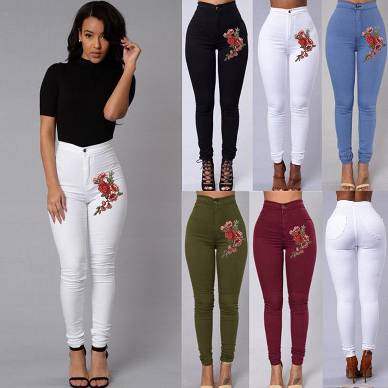 Women wearing painted stretch "mom" jeans with embroidered details in breathable hemp blend fabric