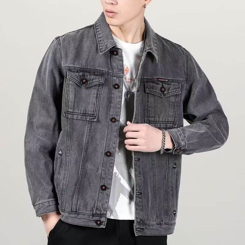 Mens stylish vintage distressed denim jacket displayed on a mannequin with long sleeves and faded cotton fabric.