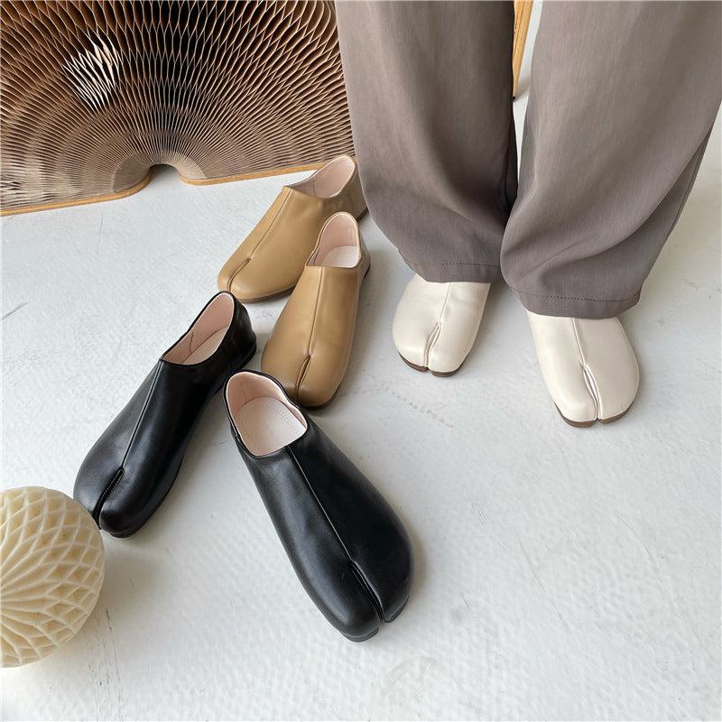 black tabi shoe flats with split-toe design and flexible microfiber upper