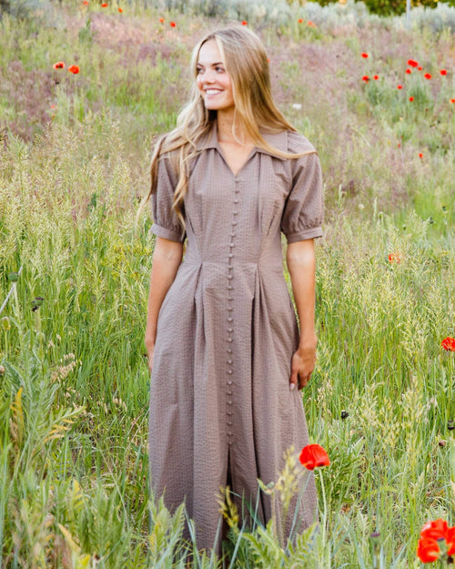 Pine Bark Femme Field Dress with A-line silhouette, button-closure peasant sleeves, and side seam pockets.