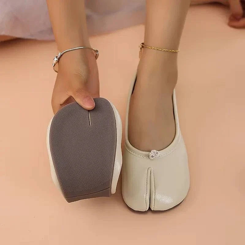 Artisan crafted soft leather tabi ballet slippers with split-toe design and flexible rubber outsole