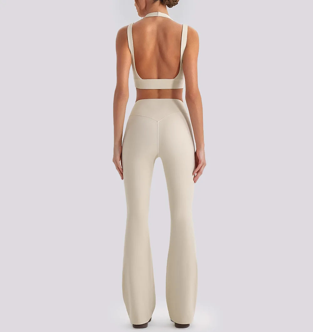 Women wearing backless V-neck tank tops and high-waist wide-leg pants yoga exercise sets performing gym workouts