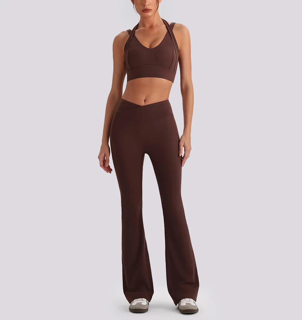 Women's yoga exercise set with backless V-neck tank top and high waist wide leg pants for gym and running