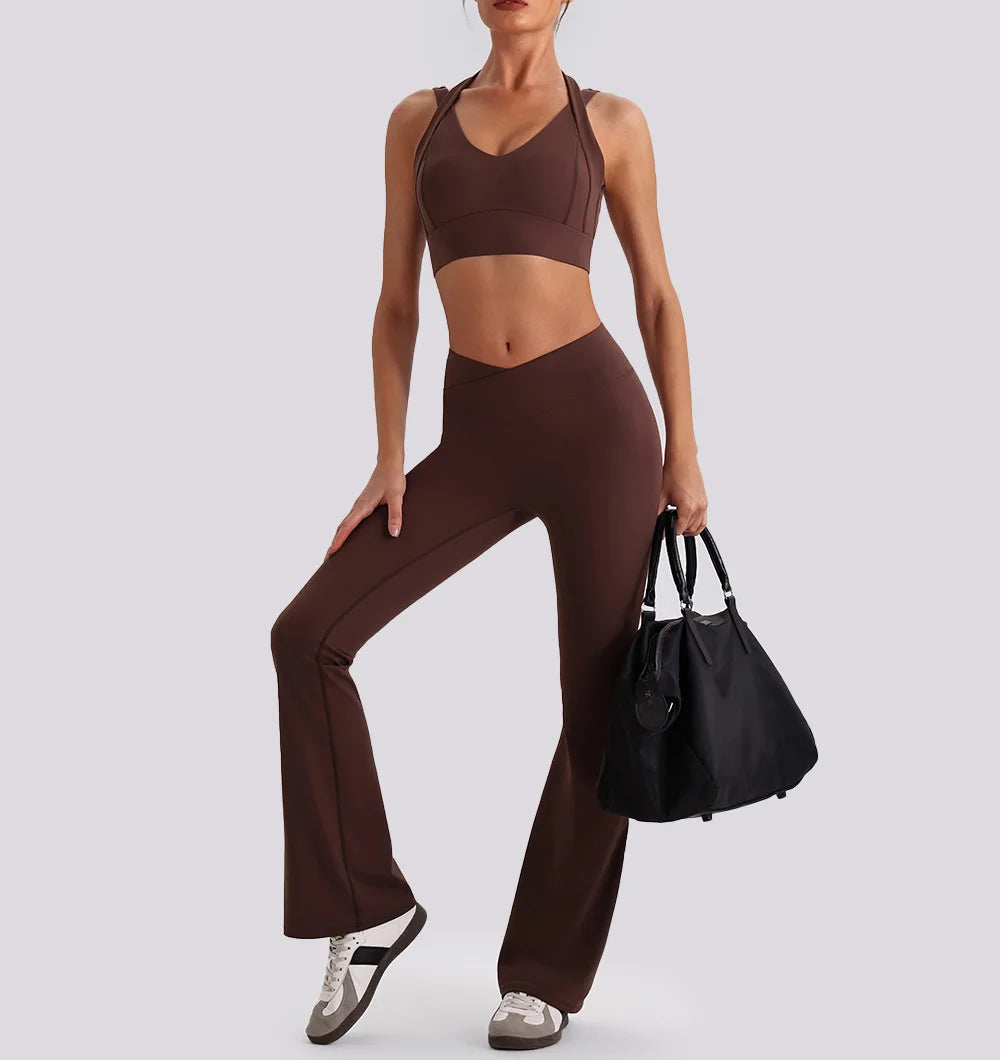 Women's yoga exercise set with backless V-neck tank top and high-waist wide-leg pants for gym and workout