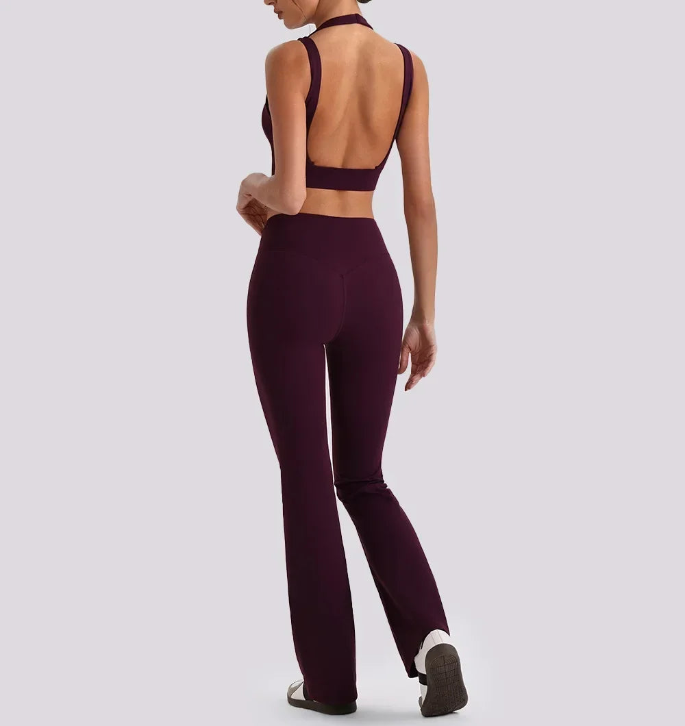 Women's yoga exercise sets featuring backless sports tank top and high waist wide leg pants for gym workout