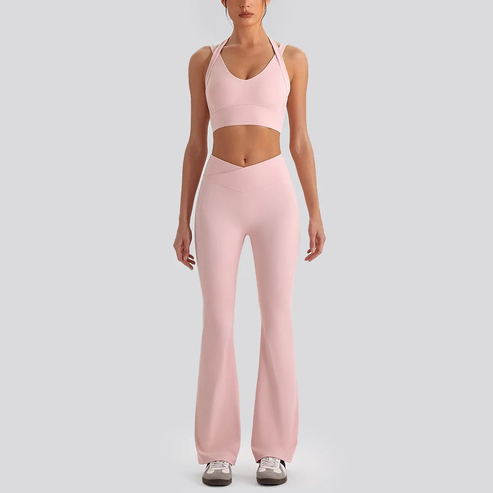 Women's yoga exercise set with backless sports tank top and high waist wide leg pants