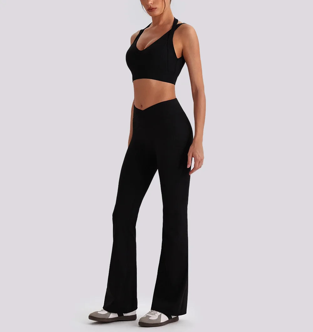 Women wearing backless sports tank tops and high waist wide leg pants yoga exercise sets
