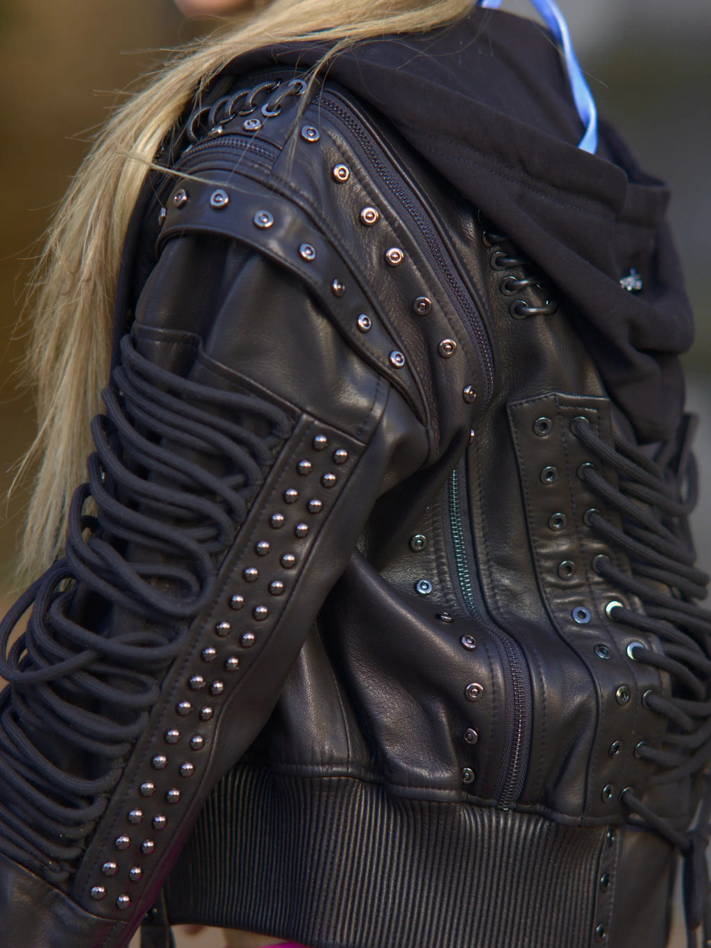 Apple Bottoms lace-up Italian lambskin leather bomber jacket with detachable fleece hood and corset sleeve lacing