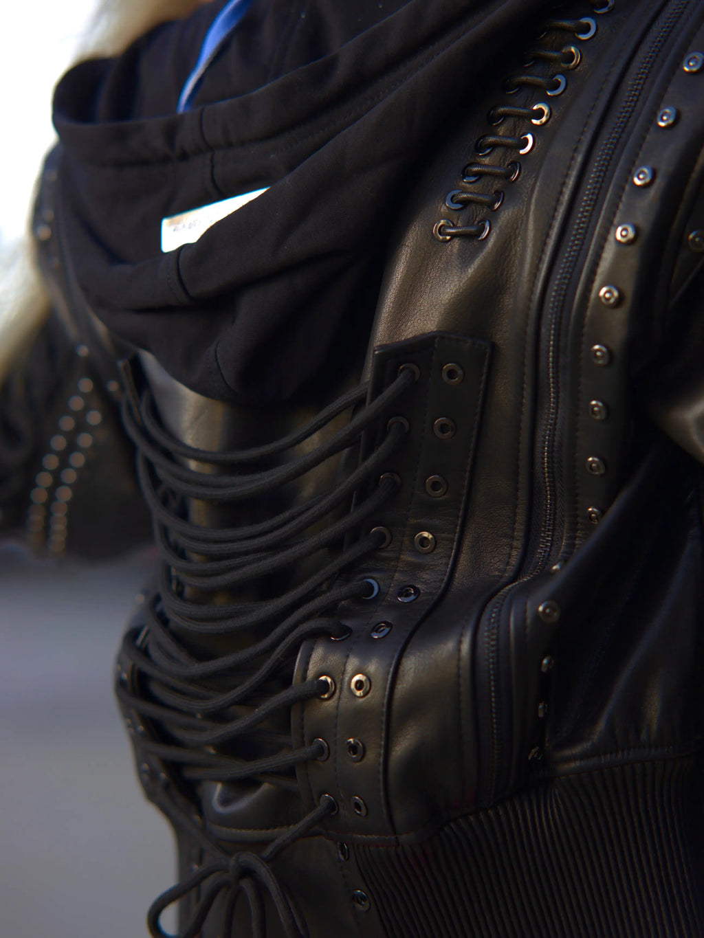 Apple Bottoms lace-up soft Italian lambskin leather bomber jacket with detachable fleece hood and sleeve corset lacing