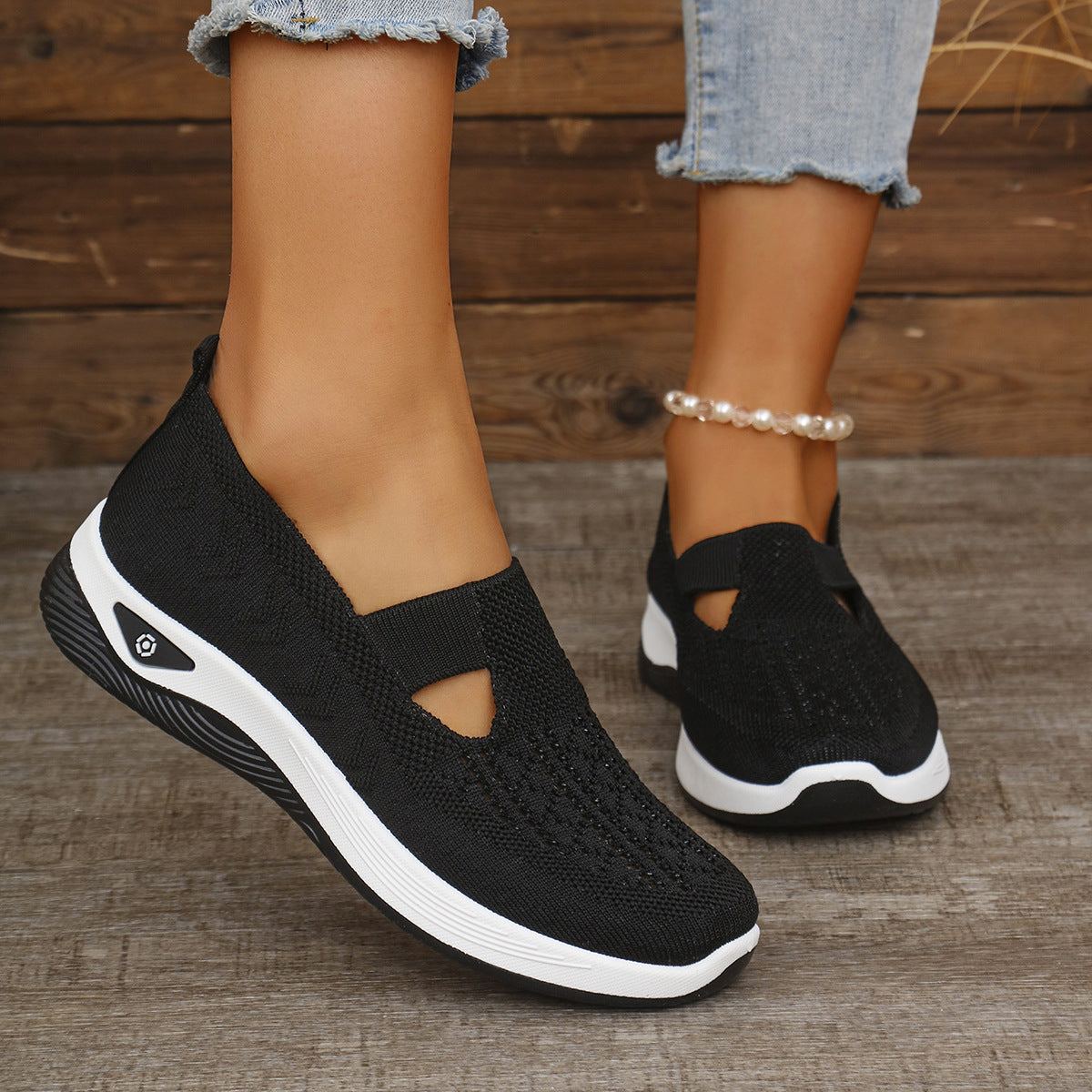 Lightweight breathable thread mesh summer shoe on feet outdoors