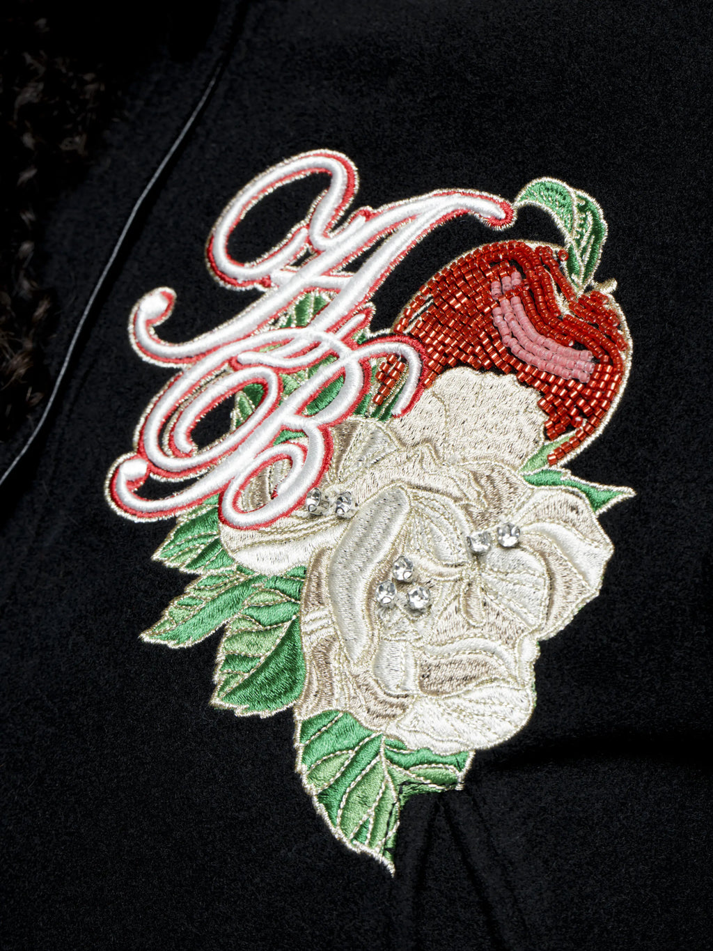 Apple Bottoms Brand varsity jacket with removable sleeves, wool body, vegan leather accents, and bold embroidered patches