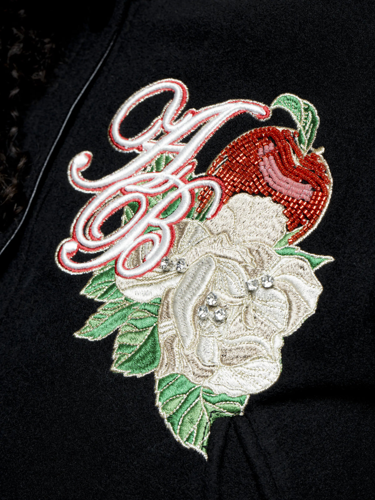 Apple Bottoms Brand varsity jacket with removable sleeves, wool body, vegan leather accents, and bold embroidered patches