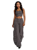 Low-rise grey stretch twill cargo pants by Apple Bottoms with wide legs and oversized pockets