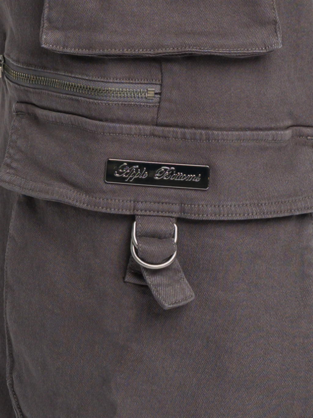 Low-rise grey stretch twill cargo pants by Apple Bottoms with wide legs and oversized pockets