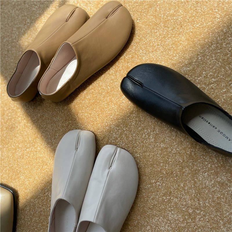black tabi shoe flats with split-toe design and flexible microfiber upper