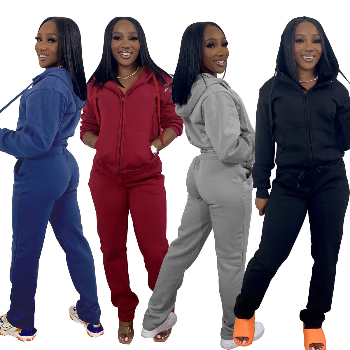 Two-piece brushed polyester fleece athletic set with hoodie and straight-leg pants in navy blue, featuring structured comfort and streetwear style