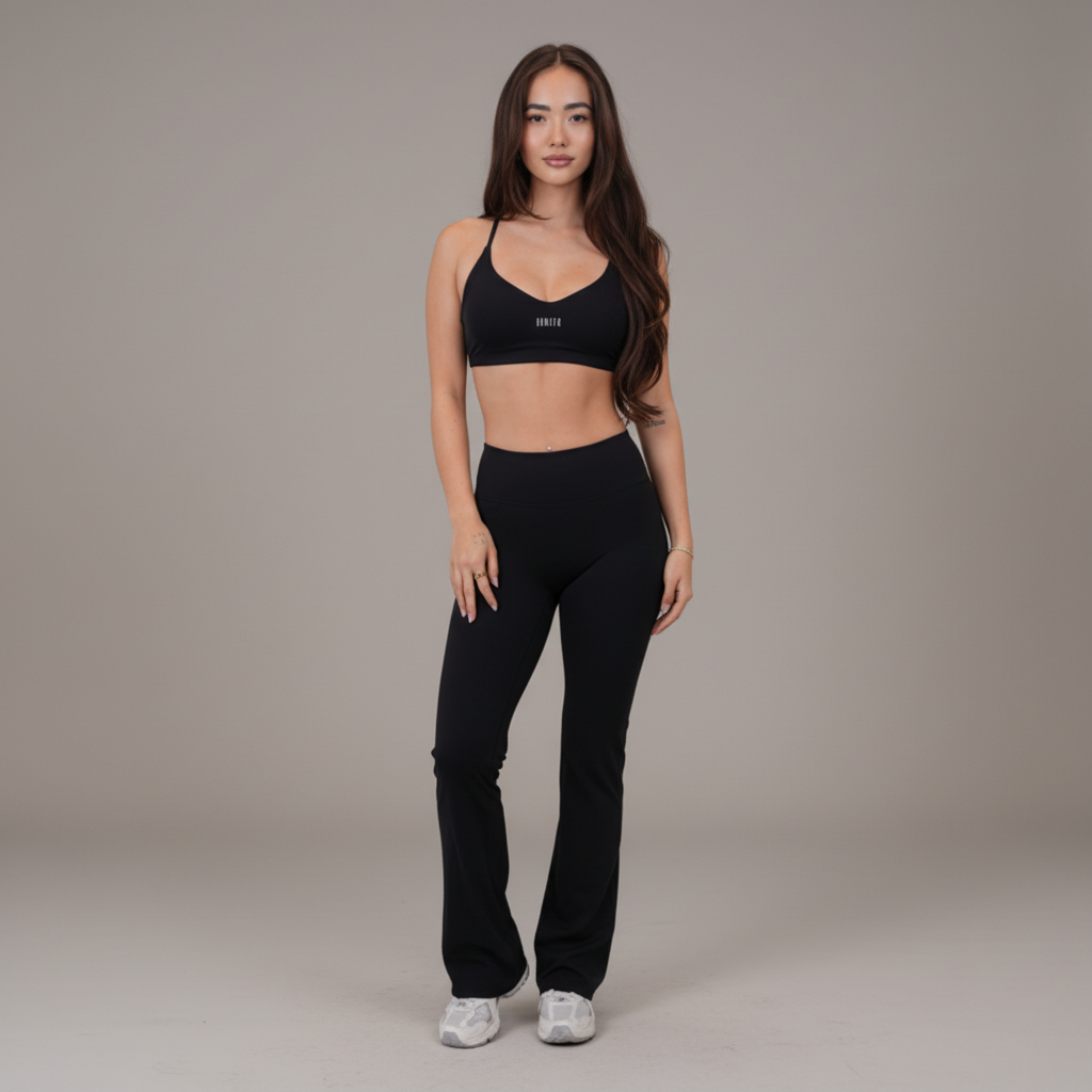 I Live in Luxury Flare Pant in black high-rise nylon and spandex with a soft flare leg and quick-dry performance fit