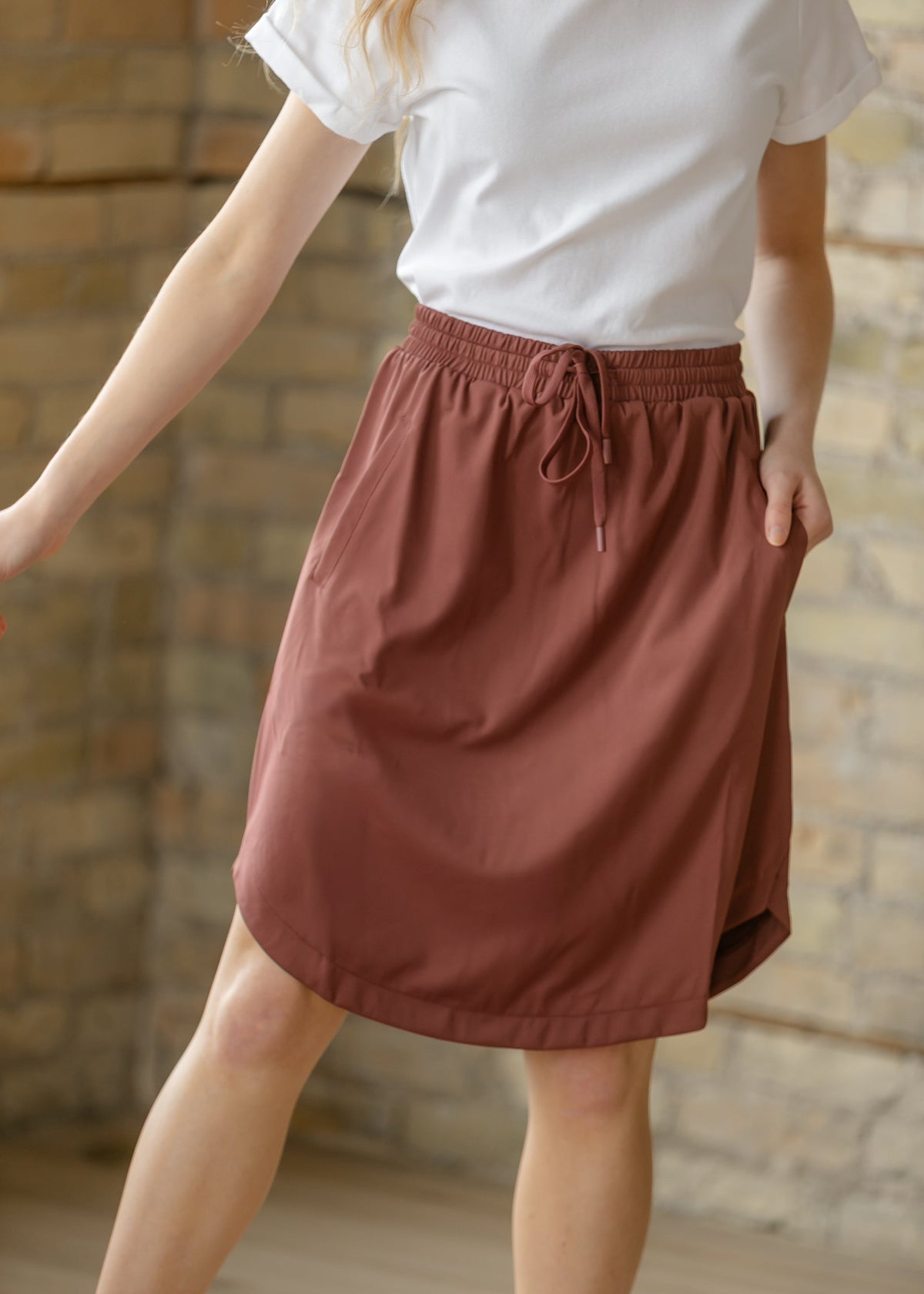 Kenedi Mulberry Sport Skirt With Built In Shorts And Side Pockets