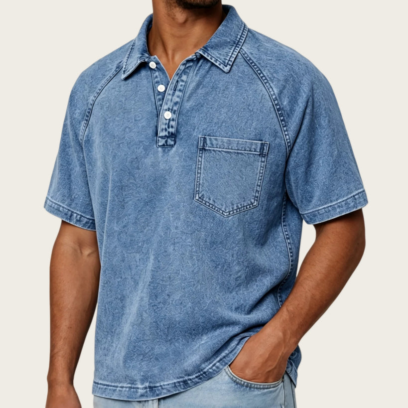 Mens Washed-and-Aged Cotton Denim Polo Shirt in faded blue with short sleeves, button placket and chest pocket