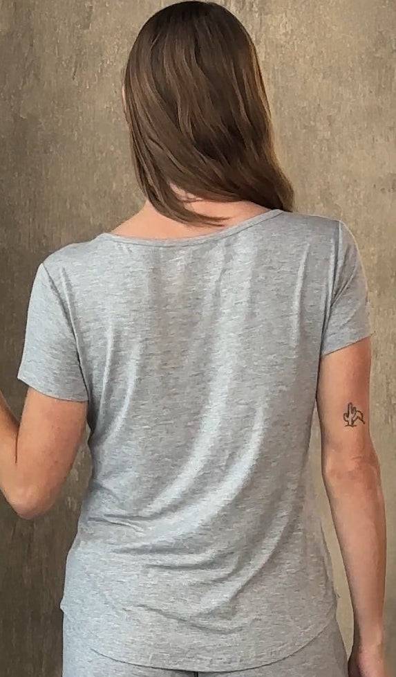 Woman wearing a breathable women’s bamboo lounge set with a crewneck t-shirt and elastic waistband shorts