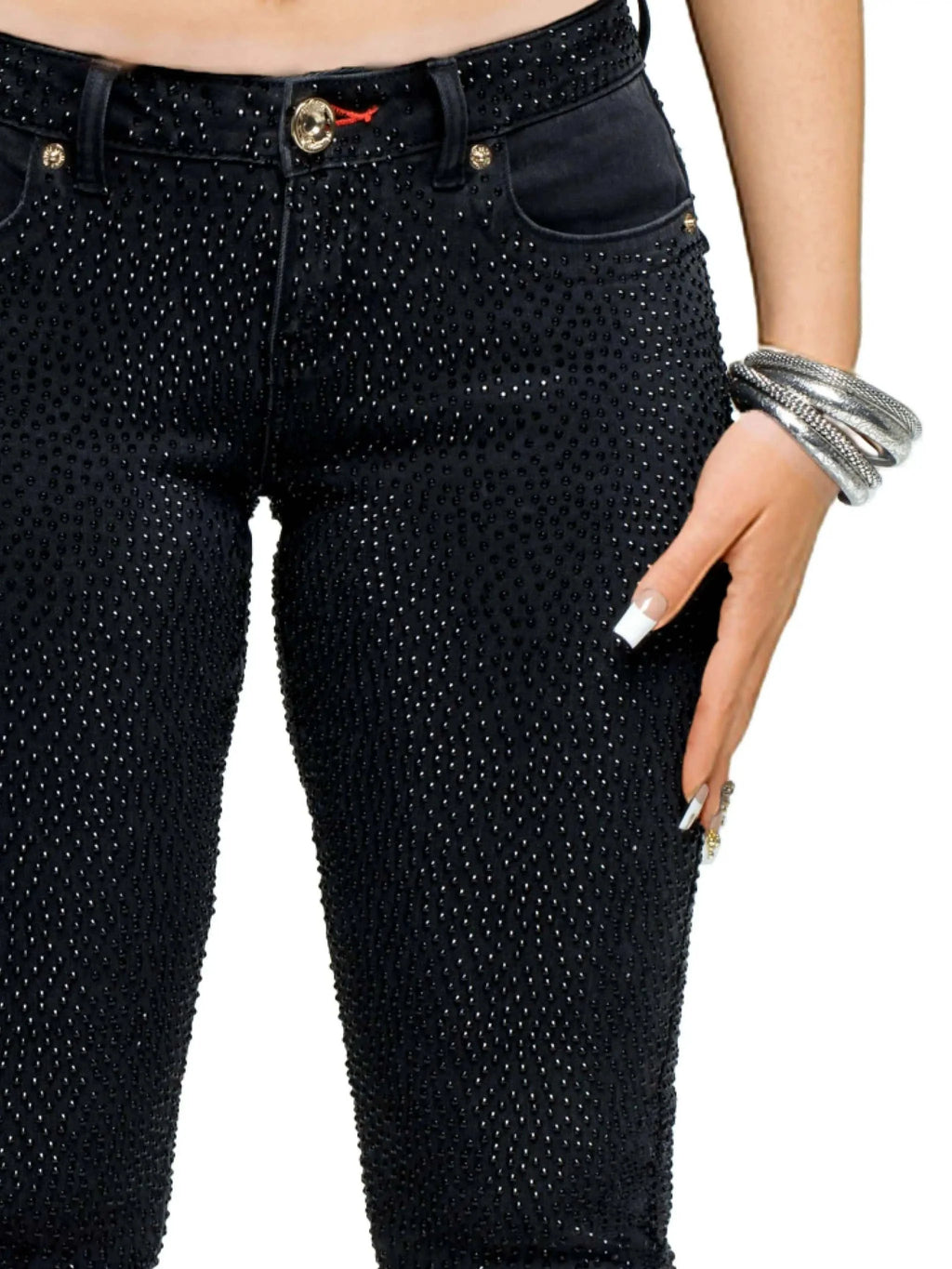Model wearing Apple Bottoms varsity jacket paired with Rain on Me Jeans featuring 3D raindrop print and rhinestone pockets